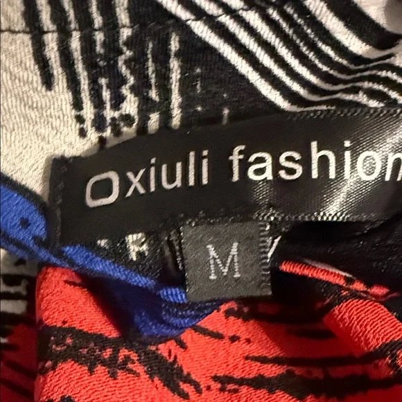 Elegant Abstract High Low Dress in Red, Blue, and Black​ - Picture 2 of 4